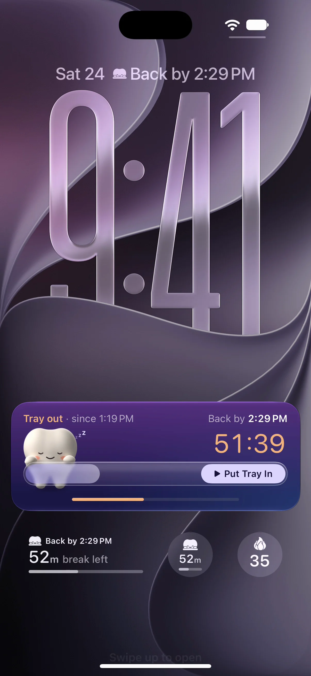 iPhone Lock Screen with the TrayHabit Live Activity: tray out since 1:19 PM, back by 2:29 PM, 51 minutes left and a Put Tray In button